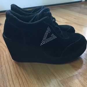 Volatile black wedged sneakers with bling
